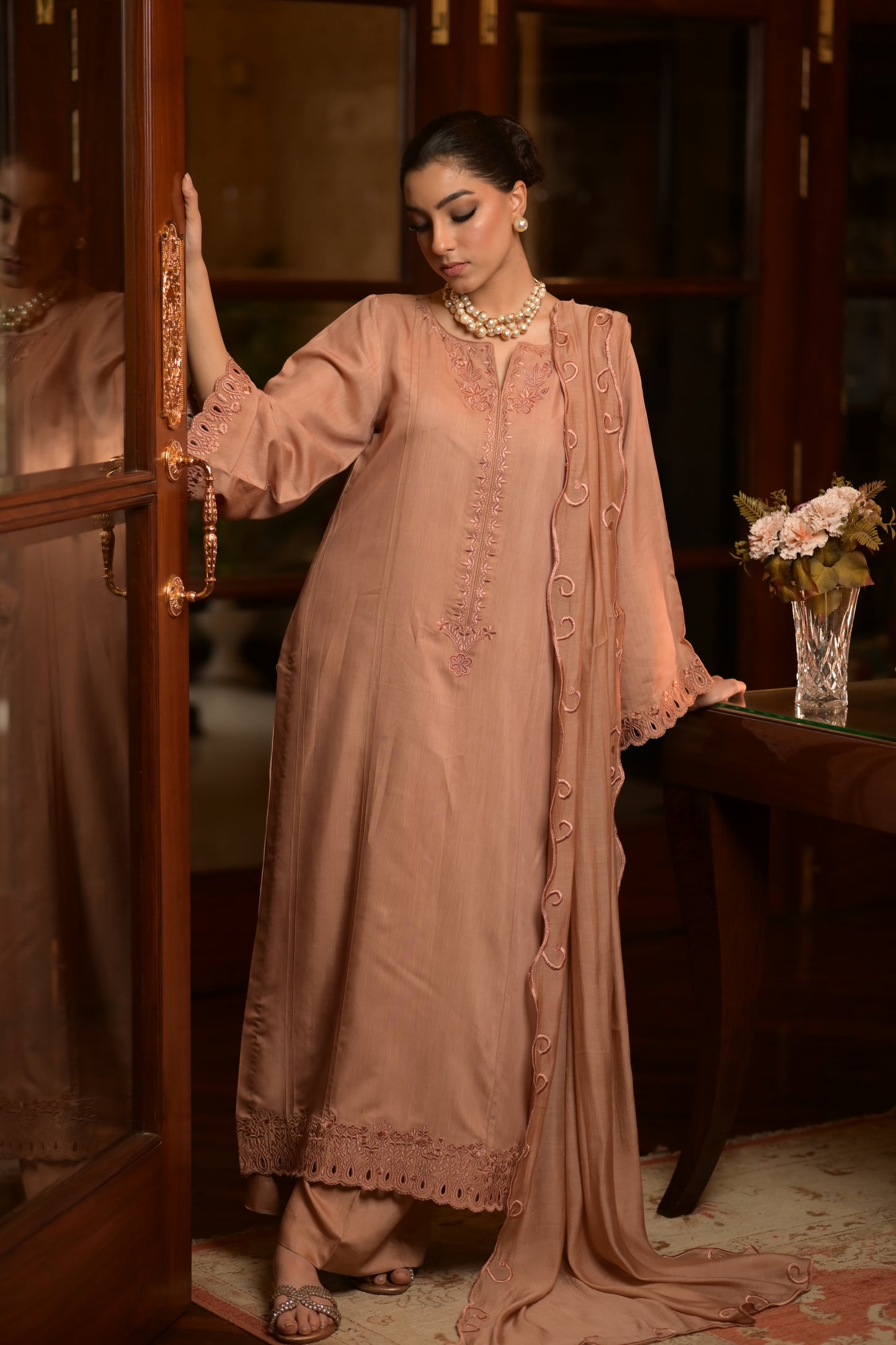 Elegant Eid outfit with clean cuts, subtle neckline, flowy embroidered sleeves, and a 4-sided embroidered dupatta.